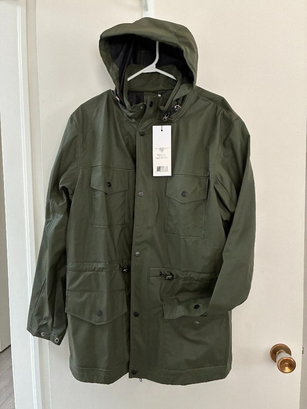 NEW. RAINS Waterproof hooded jacket Men's Med/Lge. Khaki colour.